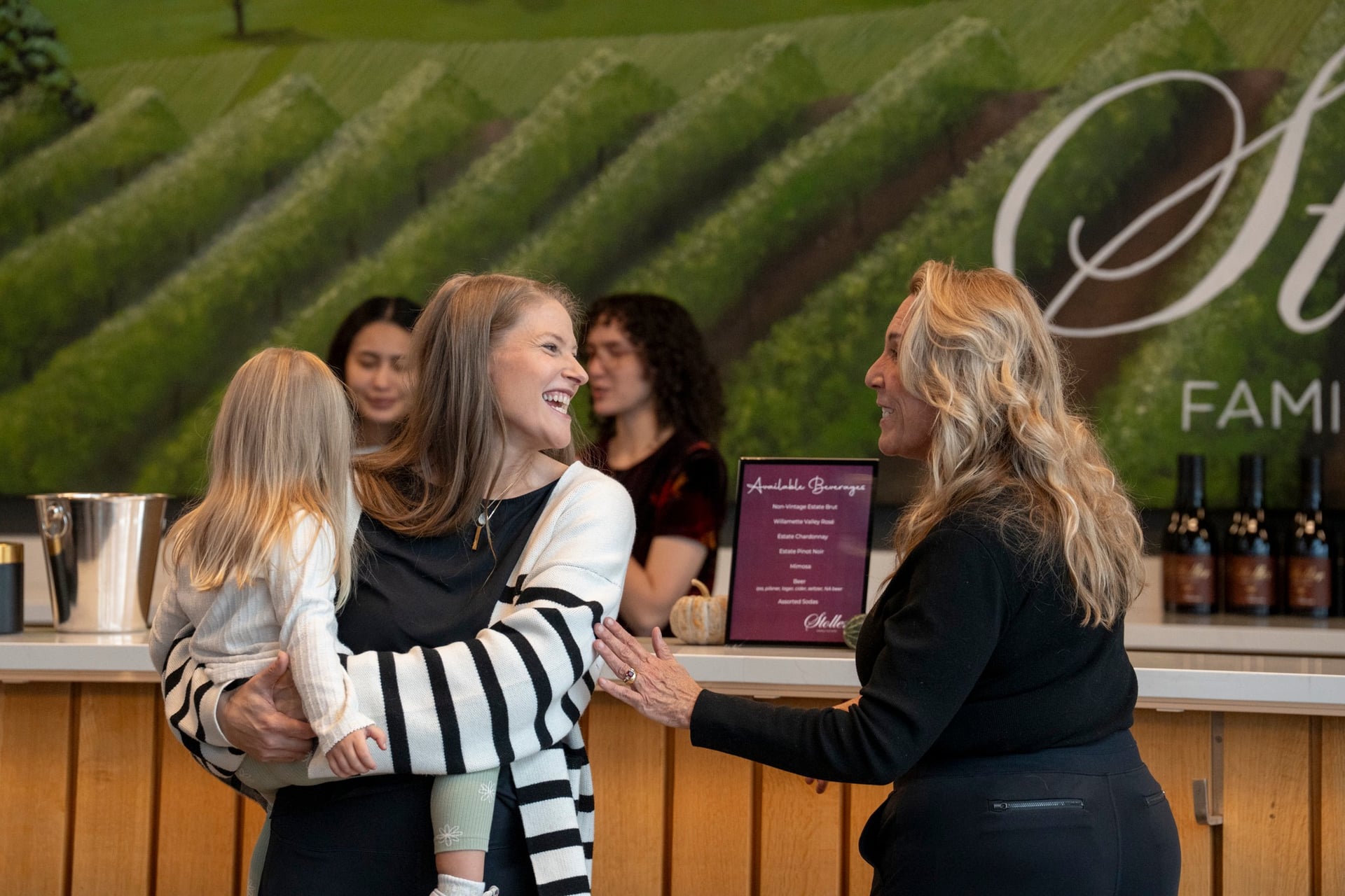 Candid lifestyle photography at a Portland vineyard event by MAGNIFY Photo